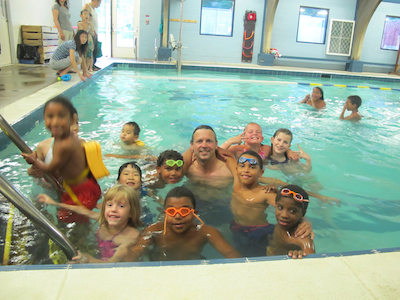 Attorney Jan Smolak and Kids in Pool photo